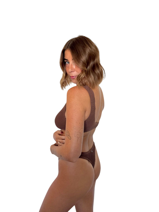 Natalie One-Piece in Coconut, worn outdoors on a LOKAL model